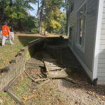 Aging deck and retaining wall that needs replacing.