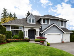 Modern home with a vibrant, healthy lawn that has been well maintained. 